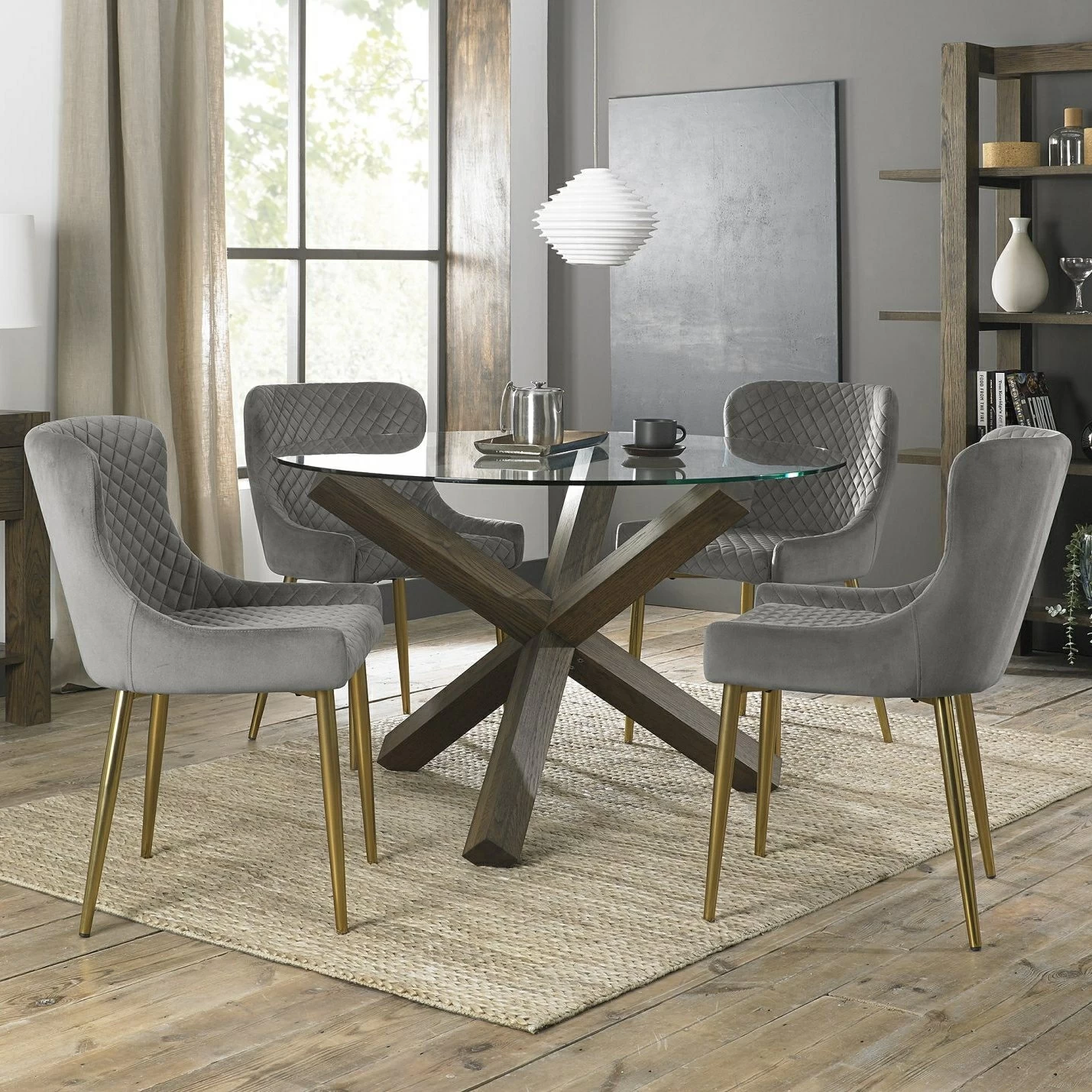 Round glass dining table sales with oak legs