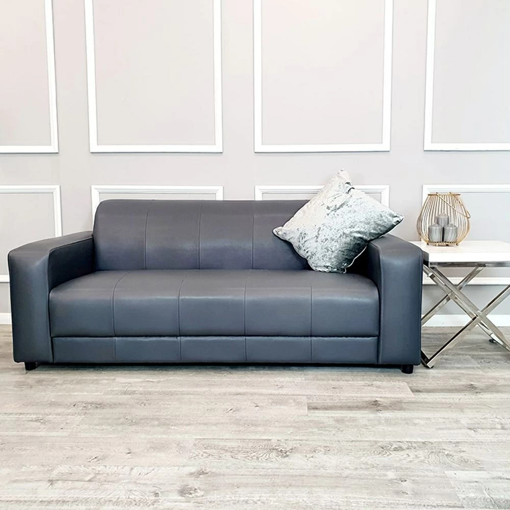 Black leather couch hot sale with white stitching